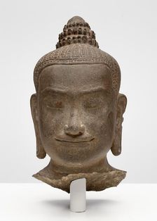 Head of a Buddhist Deity, Possibly Prajnaparamita, Angkor period, late 12th/early 13th century. Creator: Unknown
