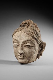 Head of a female. From Ajina Tepe, 7th-8th century. Creator: Central Asian Art