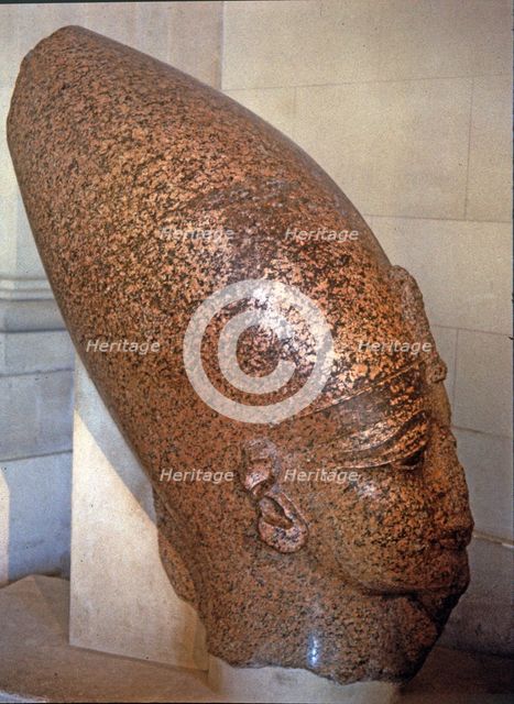Head of Amenhotep III, on pink granite, it comes from his temple at Thebes.