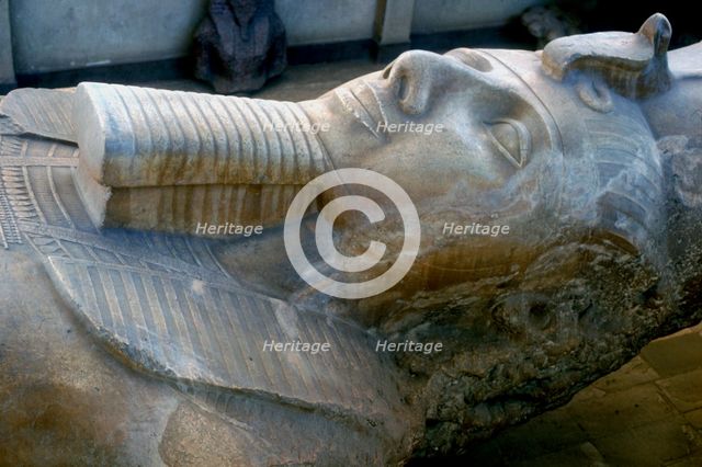 Head of colossal statue of Rameses II, Memphis, Egypt, c13th century BC. Artist: Unknown