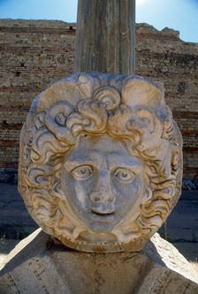 Head of Medusa, Ancient Roman city of Leptis Magna, Libya. Creator: Vivienne Sharp