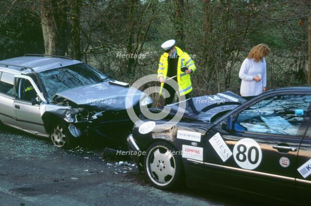 Head on Collision on country road. Artist: Unknown.