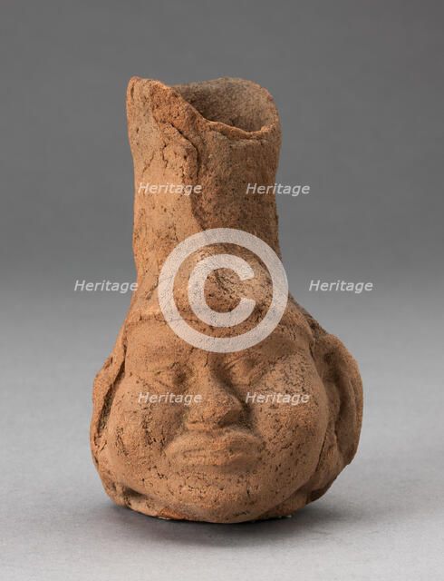 Heavily Eroded Miniature Jar in Form of a Human Head with Large Cheeks, 100 B.C./A.D. 500. Creator: Unknown.