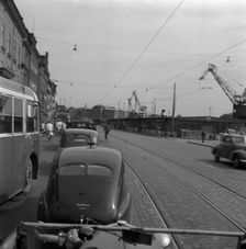 Heavy traffic outside the Royal Palace, Stockholm, Sweden, 1950. Creator: Torkel Lindeberg