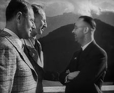 Heinrich Himmler Talking to Two Other Men, 1942. Creator: British Pathe Ltd