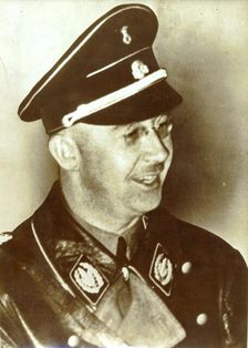 Heinrich Himmler in early SS uniform (black tie and cap) with the rank of Oberführer, 1933