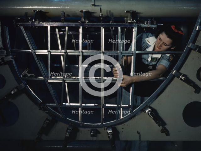 Helen Bray, who left school to become a mech..., Consolidated Aircraft Corp, Fort Worth, Texas, 1942 Creator: Howard Hollem.