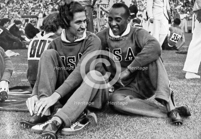 Helen Stephens and Jesse Owens, American athletes, Berlin Olympics, 1936. Artist: Unknown