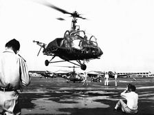 Helicopter landing at Tan Son Nhut Air Base, Saigon, Vietnam, 1953