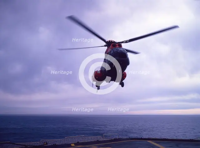Helicopter on an aircraft carrier, Falklands War, 1982. Creator: Luis Rosendo.