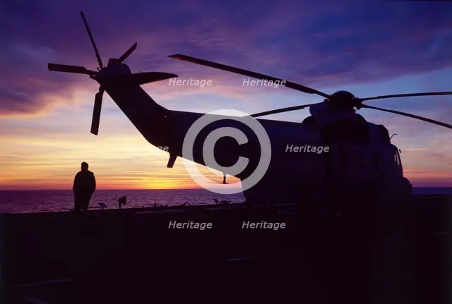 Helicopter on an aircraft carrier, Falklands War, 1982. Creator: Luis Rosendo.