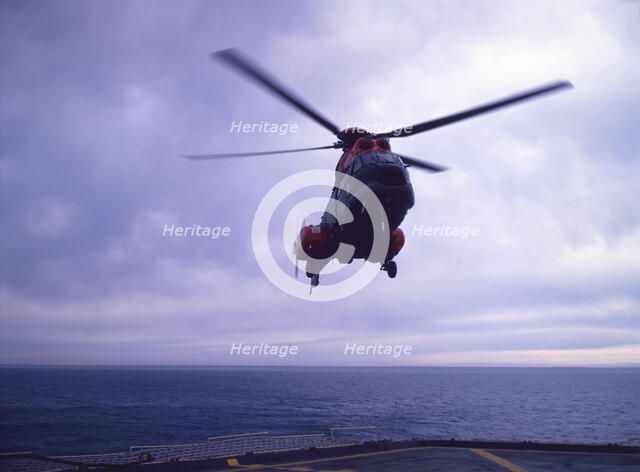 Helicopter on an aircraft carrier, Falklands War, 1982. Creator: Luis Rosendo.