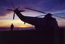 Helicopter on an aircraft carrier, Falklands War, 1982. Creator: Luis Rosendo