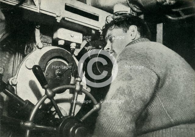 Helmsman of a British submarine, World War II, 1945. Creator: Unknown.