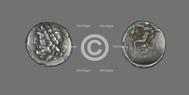 Hemidrachm (Coin) Depicting the God Zeus, late 4th century BCE. Creator: Unknown.