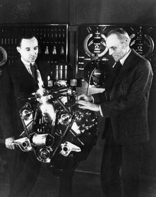 Henry and Edsel Ford with a Ford V8 engine, (c1940s?)