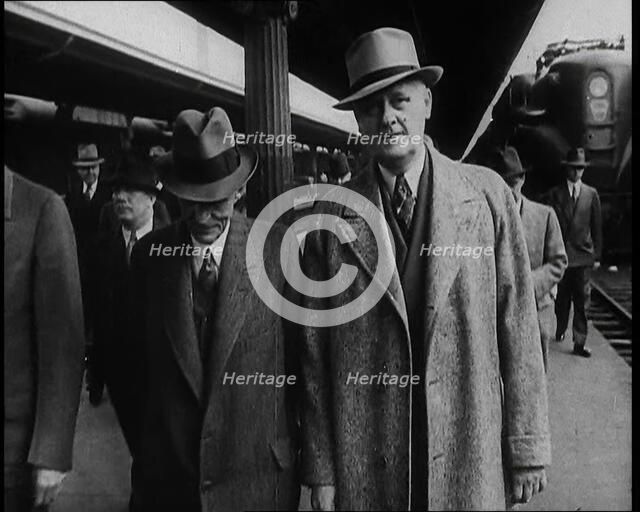 Henry Ford and His Entourage Walking Towards the Camera, 1930s. Creator: British Pathe Ltd.