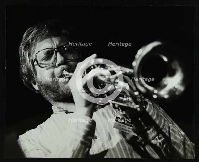 Henry Lowther playing the trumpet at The Stables, Wavendon, Buckinghamshire. Creator: Denis Williams.