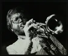 Henry Lowther playing the trumpet at The Stables, Wavendon, Buckinghamshire. Creator: Denis Williams