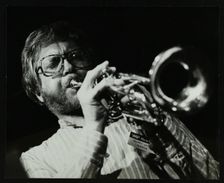 Henry Lowther playing the trumpet at The Stables, Wavendon, Buckinghamshire. Creator: Denis Williams