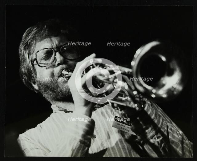 Henry Lowther playing the trumpet at The Stables, Wavendon, Buckinghamshire. Artist: Denis Williams