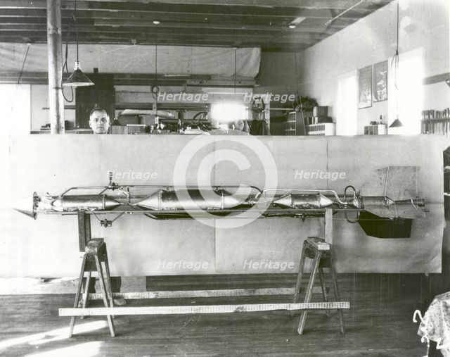 Henry Sachs with Robert Goddard's Rocket in New Mexico, USA, 1930. Creator: NASA.