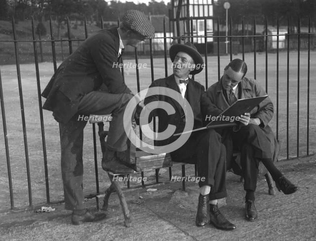 Henry Segrave, and Malcolm Campbell, with motoring artist Frederick Gordon Crosby, Brooklands. Artist: Bill Brunell.