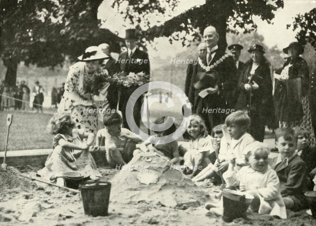 'Her Majesty ..., at the New Playground on the Site of the Old Foundling Hospital', 1936, 1937. Creator: Unknown.