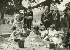 Her Majesty ..., at the New Playground on the Site of the Old Foundling Hospital 1936, 1937. Creator: Unknown