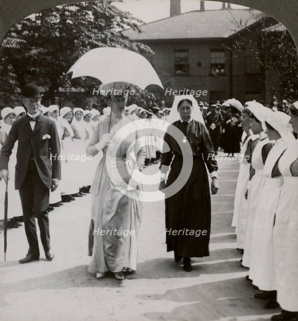 Her Majesty walking through the guard of honour of nurses of RN Hospital, Hull, 20th century. Artist: Realistic Travels Publishers