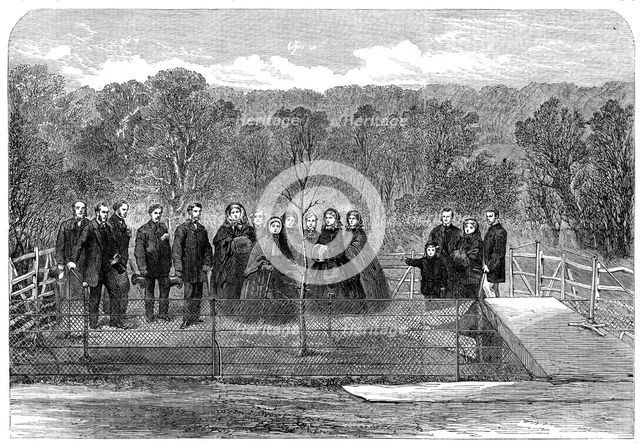 Her Majesty the Queen planting the "Prince Consort's Oak" in Windsor Great Park, 1862. Creator: Unknown.