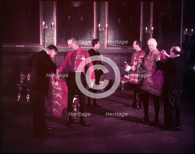 Heralds robing at St. James's Palace, London, 1953.  Creator: Arthur Charles Kirby Ware.