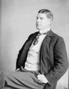 Herbert G. Squiers, half-length portrait, seated, facing left, c1904. Creator: Frances Benjamin Johnston