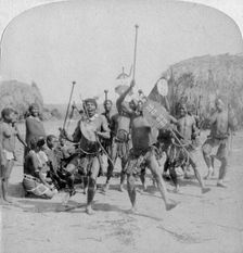 Heroic sports of the Kraal, a Zulu war dance Zululand, South Africa, 1901. Artist: Underwood & Underwood