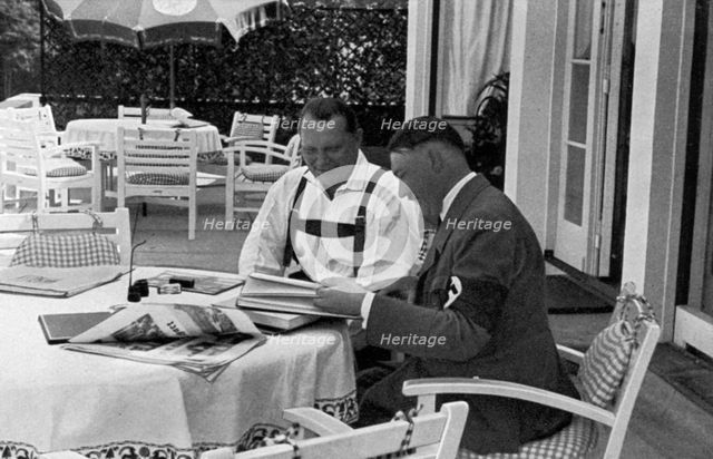 Hermann Goering and Adolf Hitler at his residence in Obersalzberg, Bavaria, Germany, 1936. Artist: Unknown
