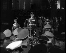 Hermann Goering Standing Before Microphones on a Decorated Dais...,1937 Creator: British Pathe Ltd