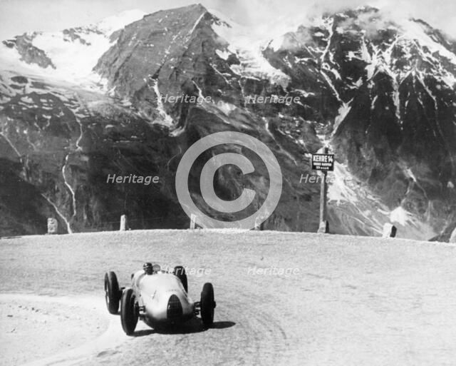 Hermann Muller in an Auto Union, German Mountain Grand Prix, Grossglockner, Austria, 1939. Artist: Unknown