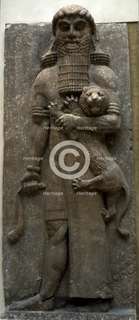 Hero Gilgamesh mastering a lion, 722-705 BC. Artist: Assyrian Art  