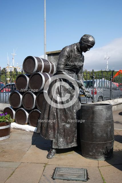 Herring Girl statue, Stornoway harbour, Isle of Lewis, Outer Hebrides, Scotland, 2009. Creator: Peter Thompson.