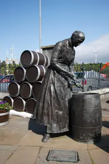 Herring Girl statue, Stornoway harbour, Isle of Lewis, Outer Hebrides, Scotland, 2009. Creator: Peter Thompson