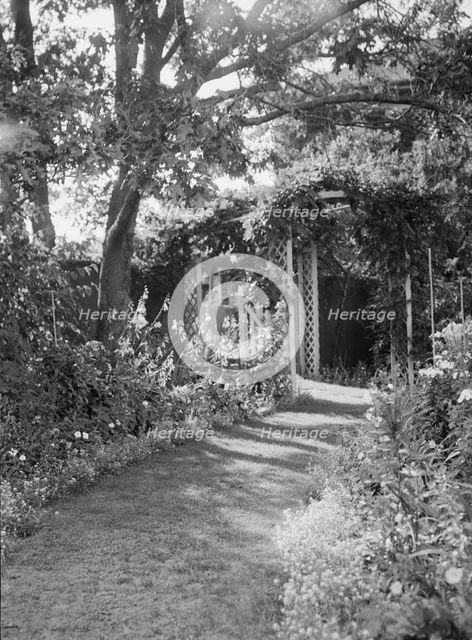 Herter, Albert, garden, between 1932 and 1942. Creator: Arnold Genthe.