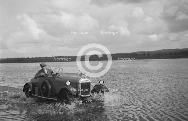 HG Pope driving a GWK through water at a demonstration event, Frensham Common Pond, Surrey, 1922. Artist: Bill Brunell.