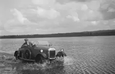 HG Pope driving a GWK through water at a demonstration event, Frensham Common Pond, Surrey, 1922. Artist: Bill Brunell