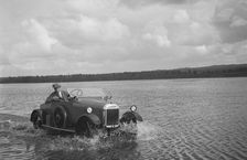 HG Pope driving a GWK through water at a demonstration event, Frensham Common Pond, Surrey, 1922. Artist: Bill Brunell