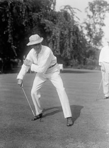 Hitchcock, Gilbert Monell, Rep. from Nebraska, 1903-5, 1907-11; Senator, 1911-23 playing golf, 1917. Creator: Harris & Ewing