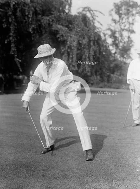 Hitchcock, Gilbert Monell, Rep. from Nebraska, 1903-5, 1907-11; Senator, 1911-23 playing golf, 1917. Creator: Harris & Ewing.