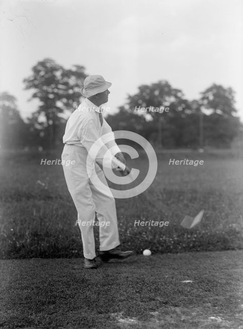 Hitchcock, Gilbert Monell, Rep. from Nebraska, 1903-5, 1907-11; Senator, 1911-23 playing golf, 1917. Creator: Harris & Ewing.