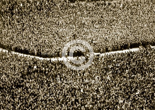 Hitler is greeted by the masses as he is driven through the crowd, Germany, c1936. Artist: Unknown