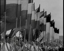 Hitler Youth Members Holding Flags, 1930s. Creator: British Pathe Ltd