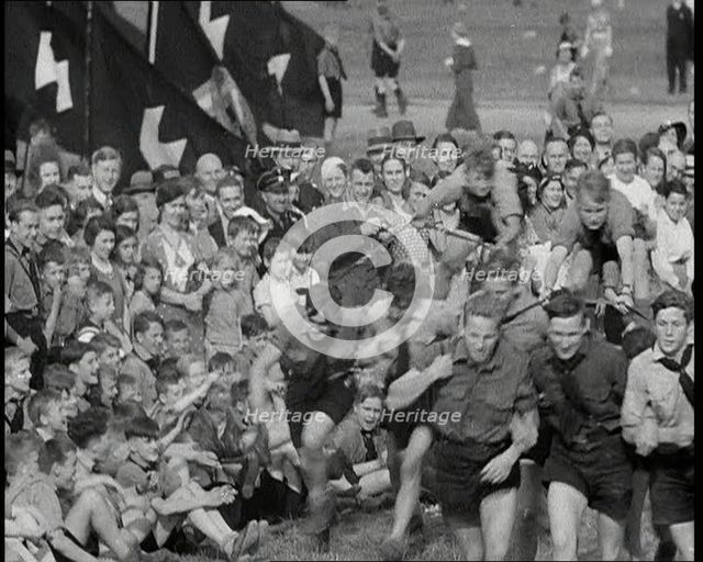 Hitler Youth Boys Engaging in Sporting Activities at  a Camp, 1930s. Creator: British Pathe Ltd.